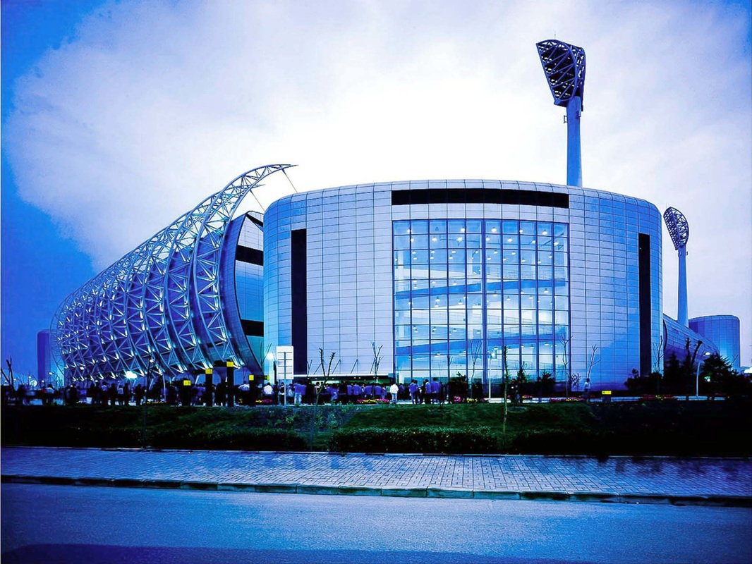 Stadium with a ribbed steel sail structure, Tianjin, China